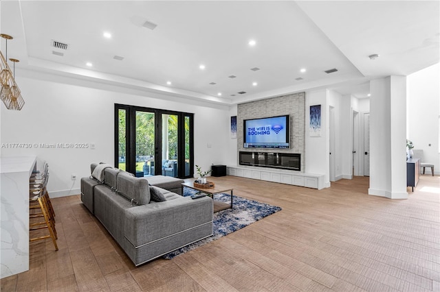 7767 SW 188th St, Cutler Bay, FL 33157 - living area with a tray ceiling, recessed lighting, and baseboards