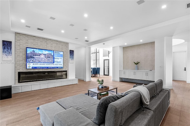 7767 SW 188th St, Cutler Bay, FL 33157 - living room with recessed lighting, light wood-style flooring, and baseboards