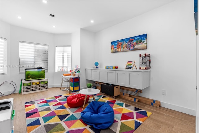 7767 SW 188th St, Cutler Bay, FL 33157 - playroom featuring wood finished floors, recessed lighting, and baseboards