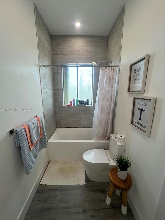 7767 SW 188th St, Cutler Bay, FL 33157 - bathroom with baseboards, shower / tub combo with curtain, toilet, and wood finished floors