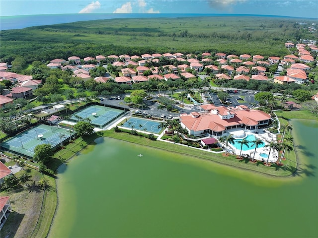 7767 SW 188th St, Cutler Bay, FL 33157 - aerial view of residential area featuring a nearby body of water, a pool, and a heavily wooded area
