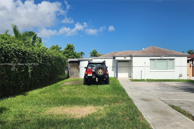 8254 SW 147th Pl, Miami, FL 33193 - view of side of home with stucco siding and a lawn