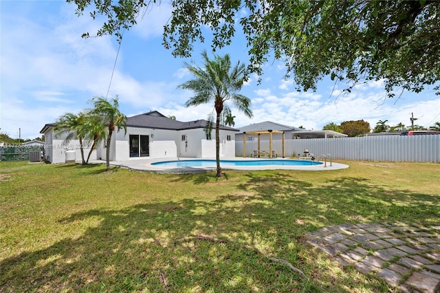 view of yard with a fenced backyard and a fenced in pool