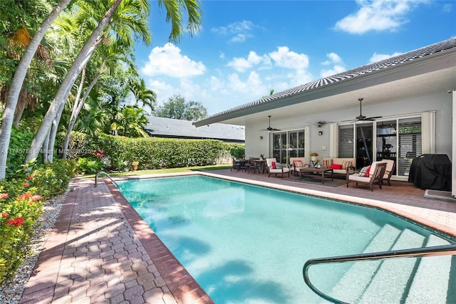 9030 SW 92nd Ct, Miami, FL 33176 - view of pool featuring a patio area, a fenced in pool, area for grilling, outdoor lounge area, and ceiling fan