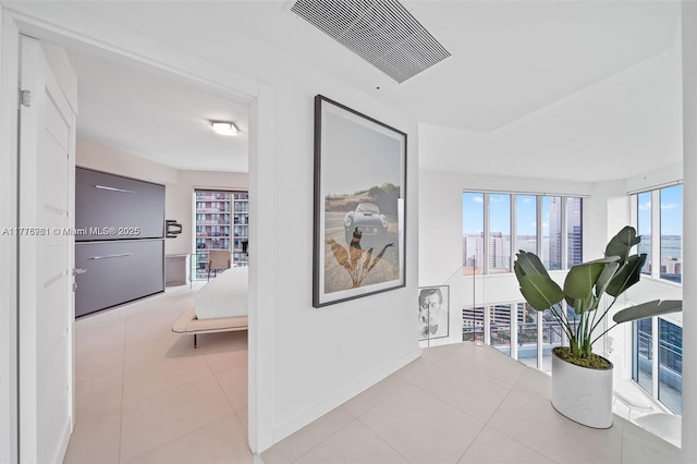 60 SW 13th St Unit 2600, Miami, FL 33130 - hall featuring tile patterned flooring and baseboards