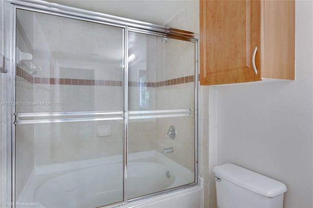6434 Emerald Dunes Dr Unit 202, West Palm Beach, FL 33411 - full bathroom featuring combined bath / shower with glass door and toilet