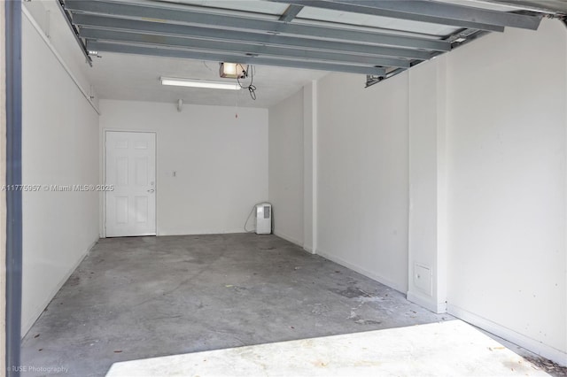 6434 Emerald Dunes Dr Unit 202, West Palm Beach, FL 33411 - garage with a garage door opener
