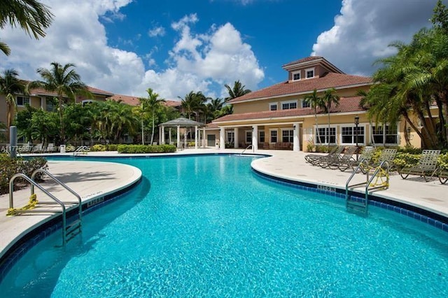 6434 Emerald Dunes Dr Unit 202, West Palm Beach, FL 33411 - community pool with a patio and a gazebo