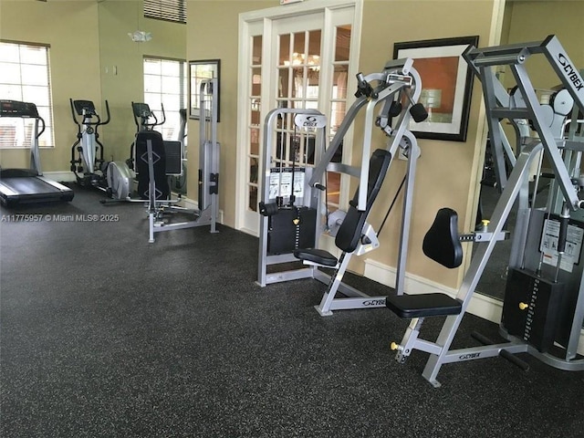 6434 Emerald Dunes Dr Unit 202, West Palm Beach, FL 33411 - workout area featuring baseboards and visible vents