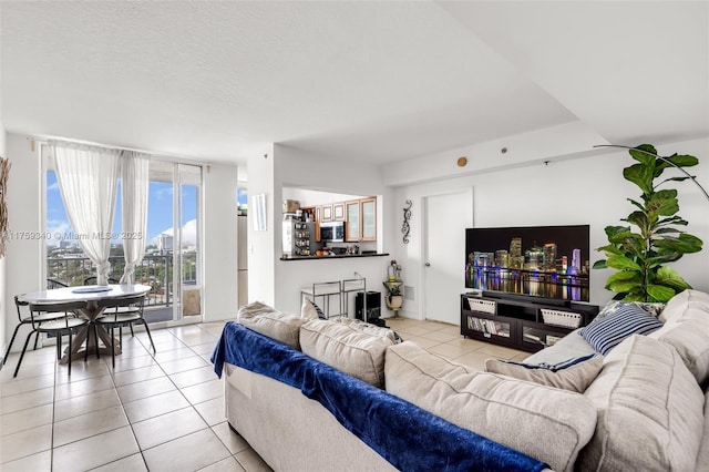 1 Glen Royal Pkwy Unit 1207, Miami, FL 33125 - living room featuring light tile patterned flooring and a textured ceiling