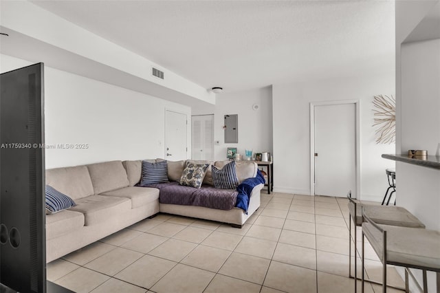 1 Glen Royal Pkwy Unit 1207, Miami, FL 33125 - living room featuring light tile patterned flooring, a textured ceiling, visible vents, and electric panel