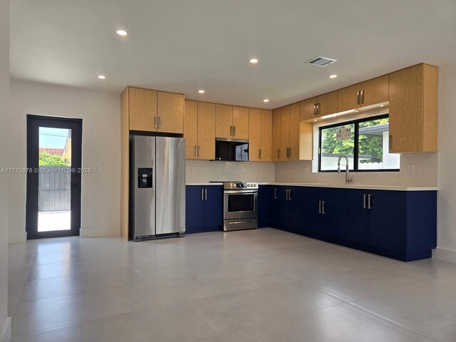 5152 SW 6th, Miami, FL 33134 - kitchen with appliances with stainless steel finishes, light countertops, decorative backsplash, recessed lighting, and a sink