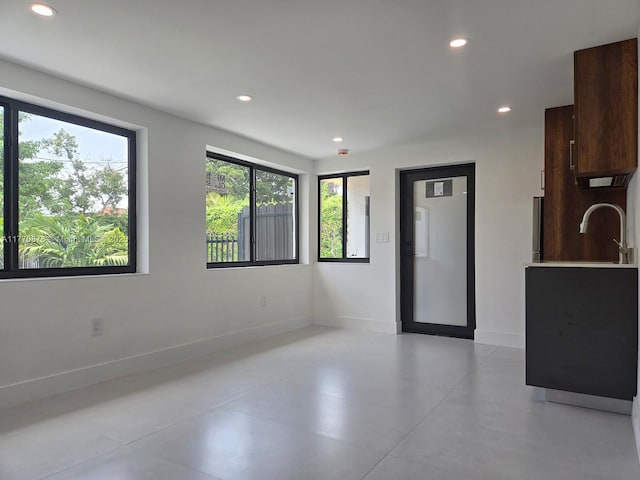 5152 SW 6th, Miami, FL 33134 - unfurnished room with recessed lighting, baseboards, and a sink