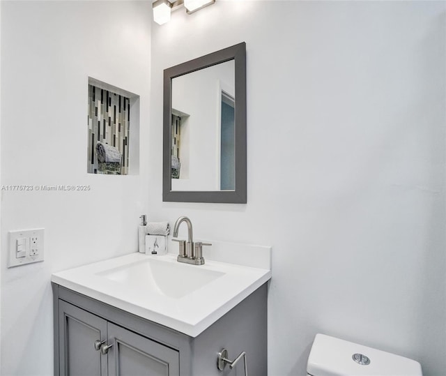 217 SE 5th St, Dania Beach, FL 33004 - bathroom with toilet and vanity