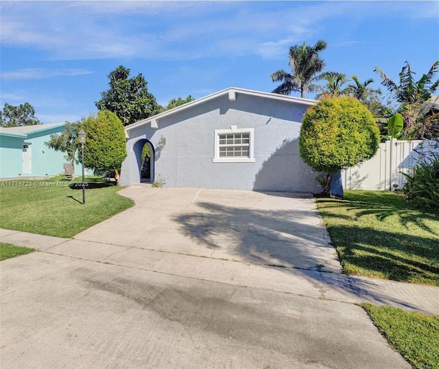 217 SE 5th St, Dania Beach, FL 33004 - view of front of home with stucco siding