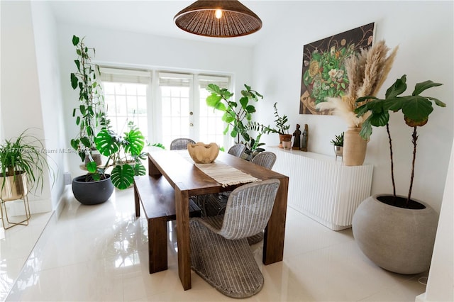 dining area with tile patterned floors
