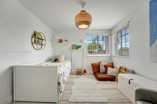 bedroom with baseboards