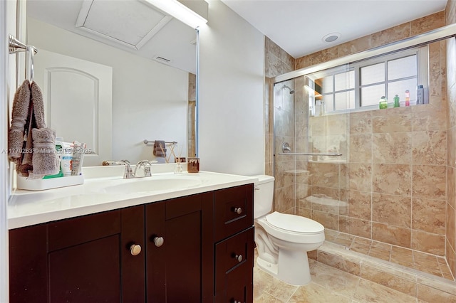 full bath featuring vanity, a stall shower, visible vents, and toilet