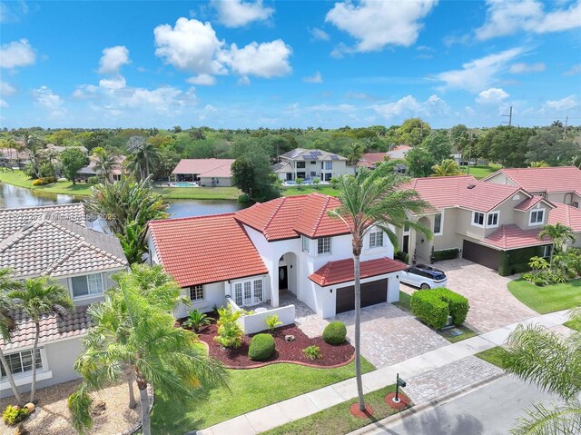 1055 San, Luis Rey, Weston, FL 33326 - aerial view of residential area featuring a large body of water