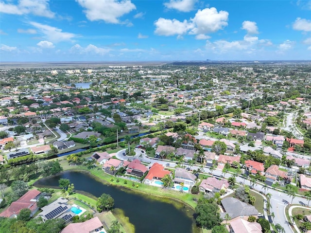 aerial view featuring a water view and a residential view