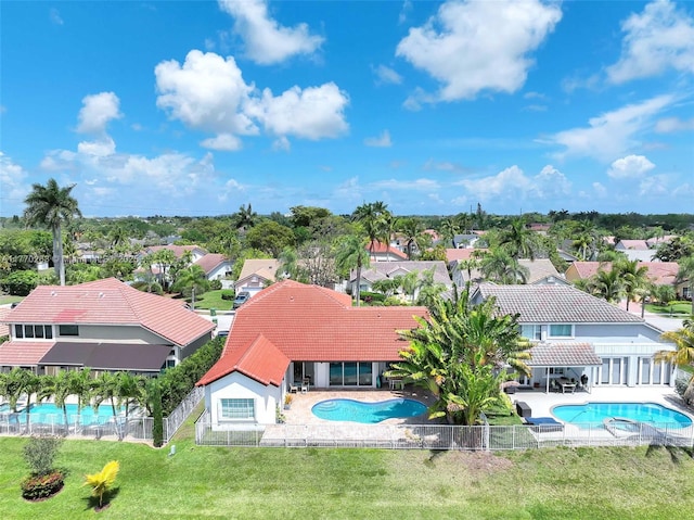 aerial view with a residential view and a water view