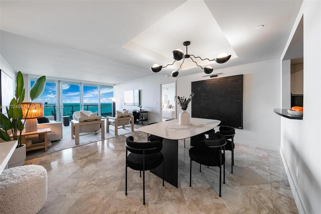 1331 Brickell Bay Dr Unit 3305, Miami, FL 33131 - dining area featuring a chandelier and floor to ceiling windows
