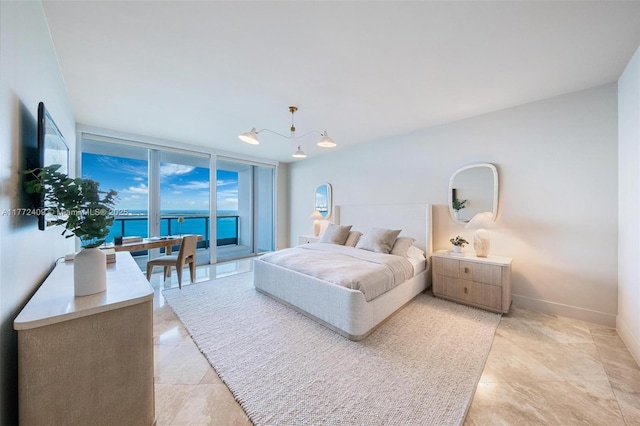 1331 Brickell Bay Dr Unit 3305, Miami, FL 33131 - bedroom featuring access to exterior, light tile patterned floors, and floor to ceiling windows