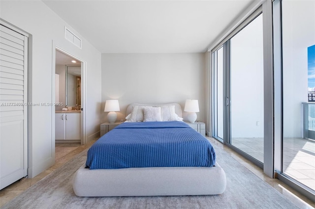 1331 Brickell Bay Dr Unit 3305, Miami, FL 33131 - bedroom featuring access to exterior and connected bathroom