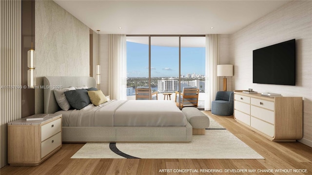 bedroom featuring light wood-style floors and a wall of windows
