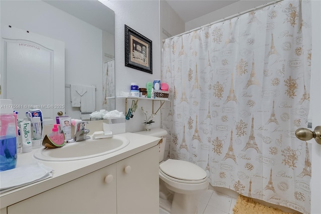full bath featuring vanity, toilet, tile patterned flooring, and curtained shower