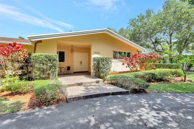 view of front of home featuring stucco siding