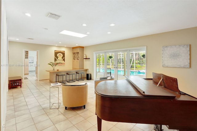 home office with recessed lighting, visible vents, and light tile patterned floors