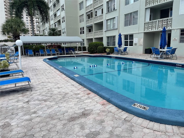 view of pool with a patio area