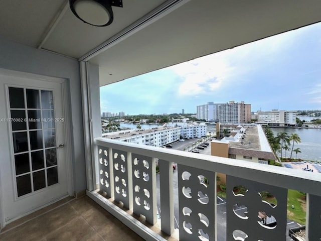 balcony with a city view and a water view