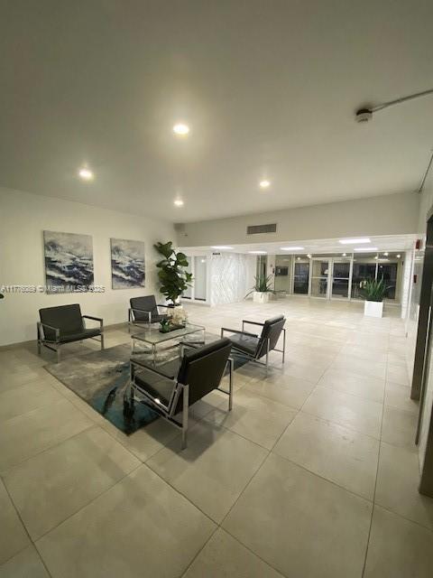 401 SE Golden Isles Dr Unit 712, Hallandale Beach, FL 33009 - building lobby with recessed lighting