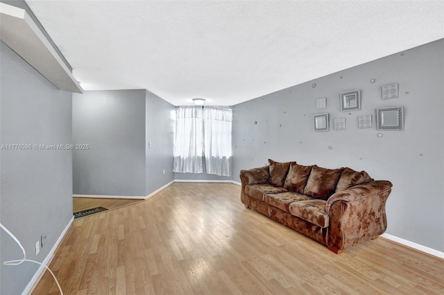 6911 Environ Blvd Unit 3L, Lauderhill, FL 33319 - living area with wood finished floors and baseboards