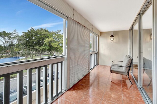 6911 Environ Blvd Unit 3L, Lauderhill, FL 33319 - unfurnished sunroom with a water view