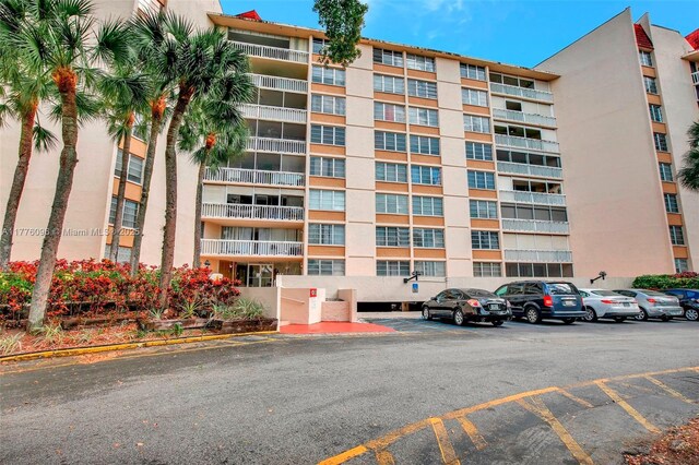 6911 Environ Blvd Unit 3L, Lauderhill, FL 33319 - view of apartment building / complex featuring uncovered parking