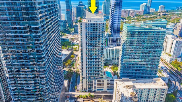 aerial view with a water view and a city view