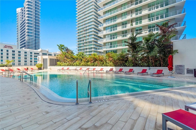 pool with a patio area