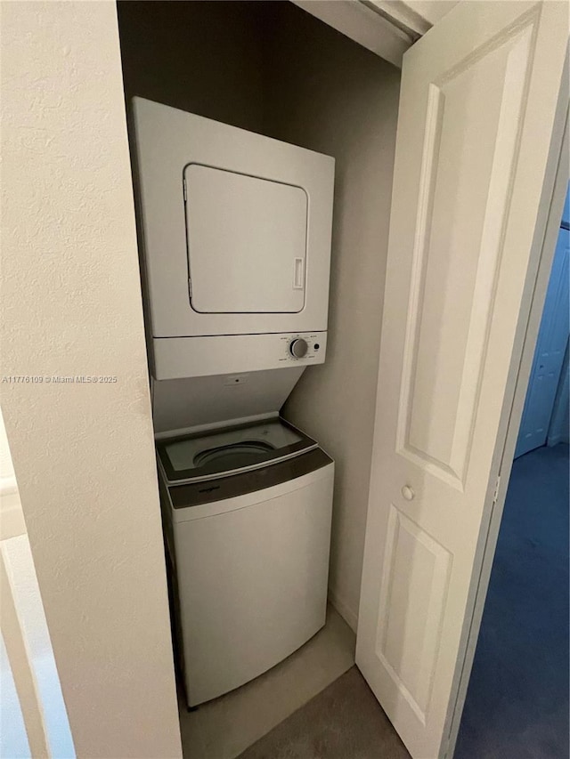 12179 NW 23rd Ct, Miami, FL 33167 - laundry room with stacked washer / drying machine