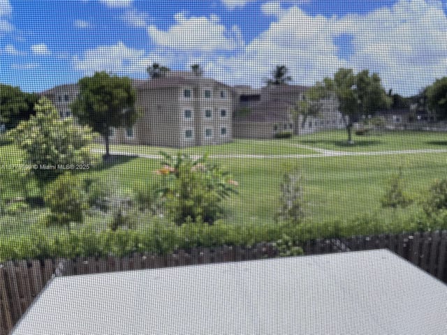 12179 NW 23rd Ct, Miami, FL 33167 - view of green lawn
