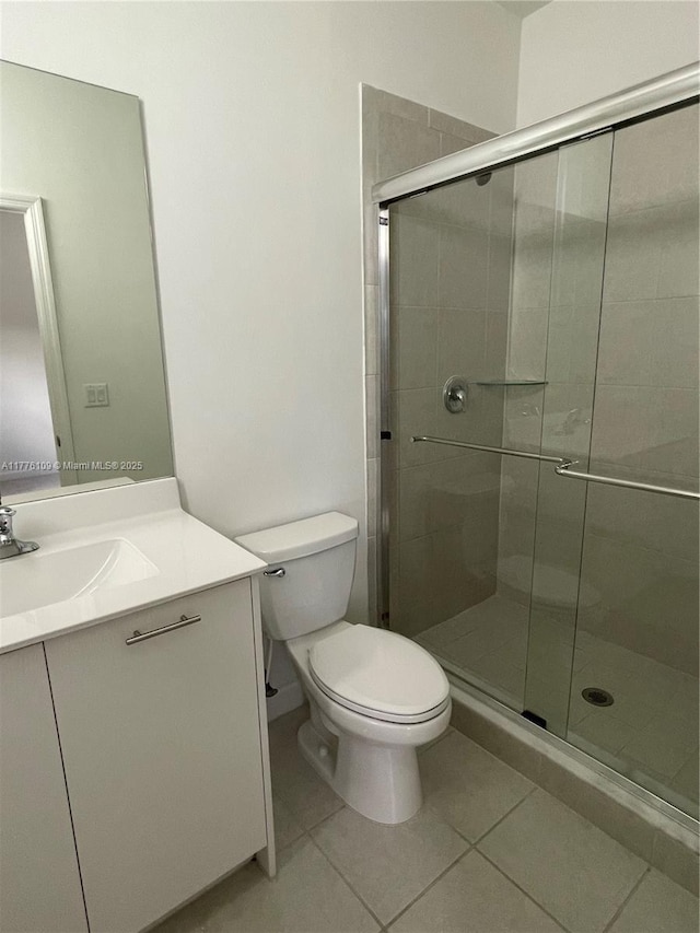 12179 NW 23rd Ct, Miami, FL 33167 - bathroom featuring vanity, a stall shower, and tile patterned flooring