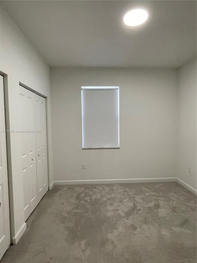 12179 NW 23rd Ct, Miami, FL 33167 - unfurnished bedroom featuring carpet floors