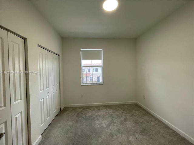 12179 NW 23rd Ct, Miami, FL 33167 - unfurnished bedroom featuring carpet and baseboards