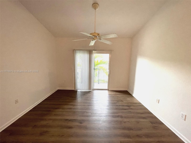 unfurnished room with a ceiling fan, dark wood-type flooring, and vaulted ceiling