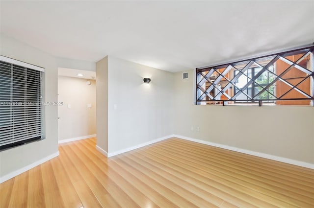 400 Valencia Ave Unit 2, Coral Gables, FL 33134 - spare room with light wood-style flooring and baseboards