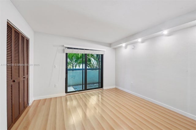 400 Valencia Ave Unit 2, Coral Gables, FL 33134 - empty room featuring light wood-type flooring and baseboards