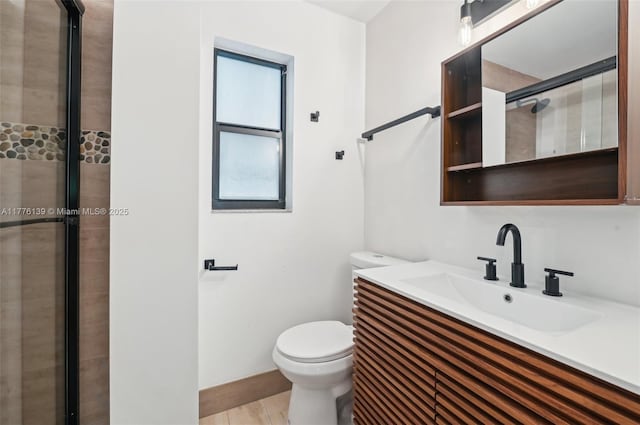 400 Valencia Ave Unit 2, Coral Gables, FL 33134 - bathroom featuring toilet, vanity, and tiled shower