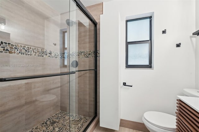 400 Valencia Ave Unit 2, Coral Gables, FL 33134 - bathroom with toilet, a stall shower, and vanity